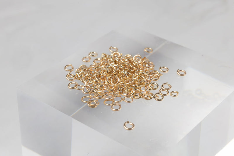 Load image into Gallery viewer, 22G 2.8mm Open Jump Ring Set of 25 - 14K Gold Filled (Yellow)
