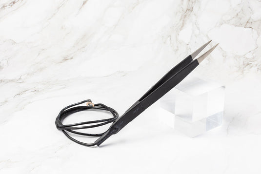 Grounded Tweezers